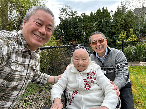 Richard takes a selfie with Lena and Dean outside