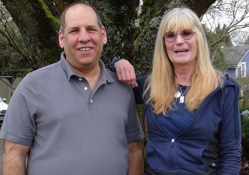 Volunteer Coordinator, Todd Lawrence and Susie Thurston, one of Housecall Providers' first primary c