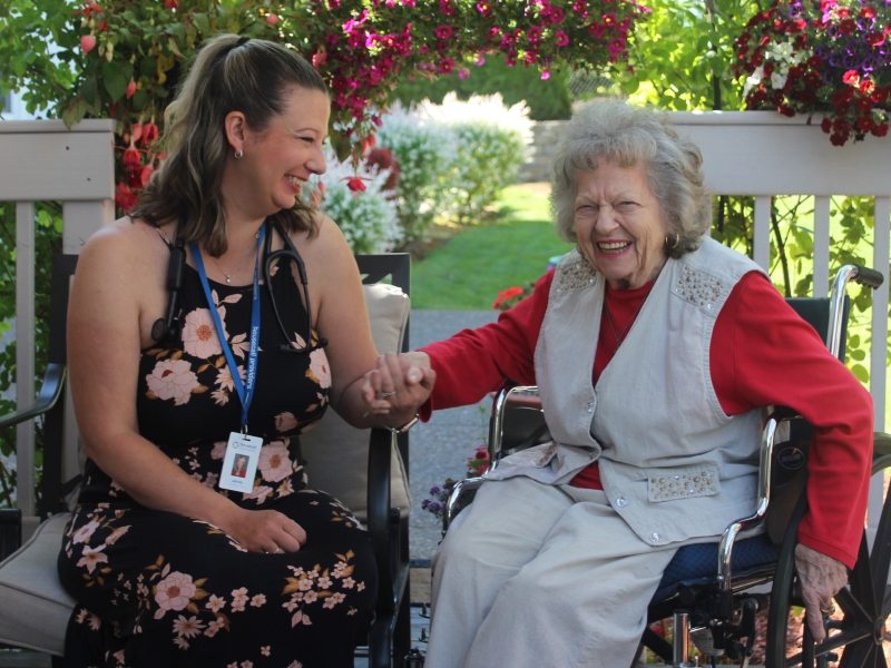 Housecall Providers primary care provider and patient outside